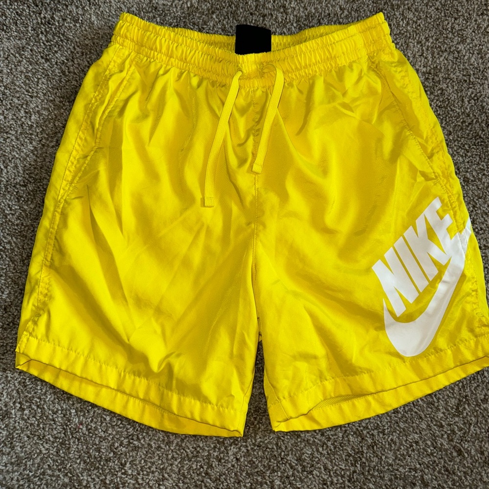 Yellow Nike shorts